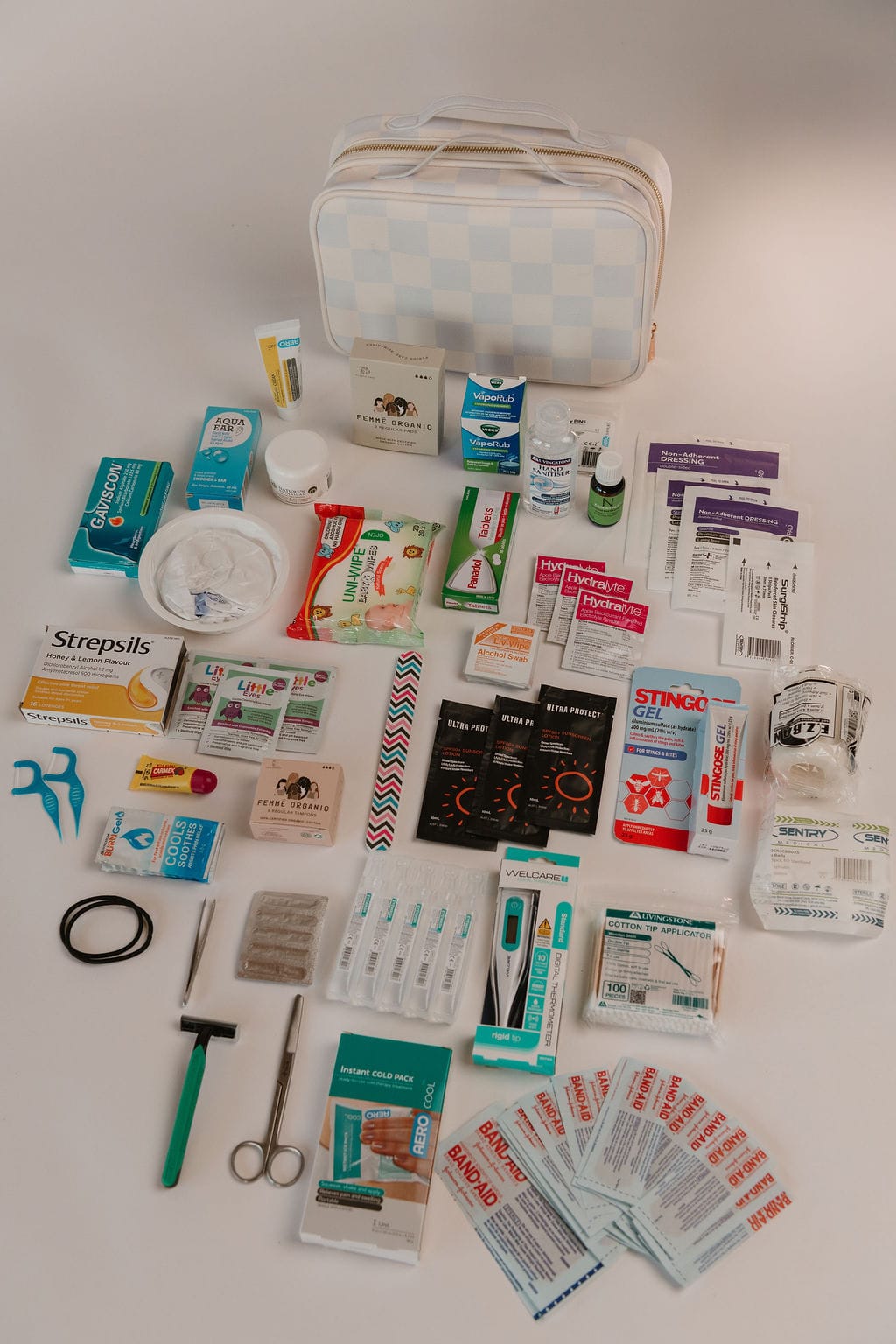 Lifepac Everyday Essentials Kit with skincare bottles and accessories on a white background.